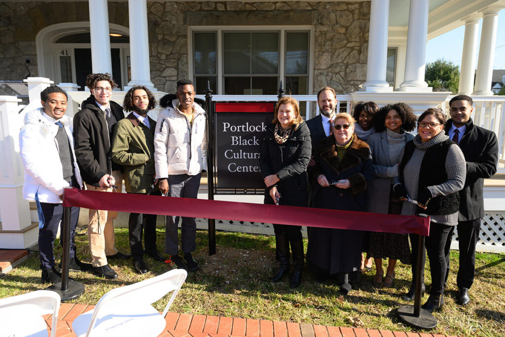 President Nicole Hurd is joined by members of the Portlock family outside of the Portlock Black Cultural Center for the building dedication