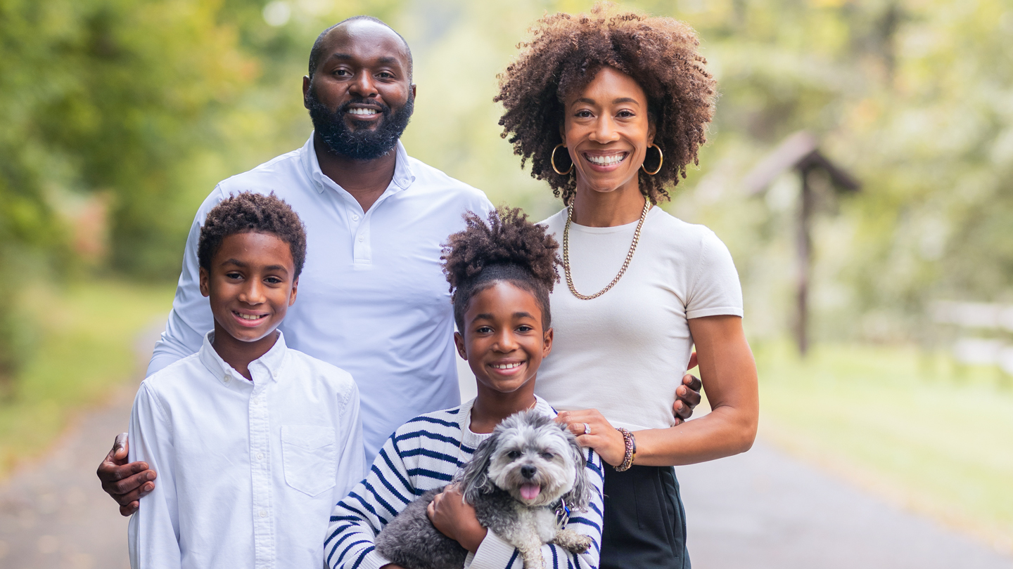 Darnell and Trish Azeez ’02 with their two children. 