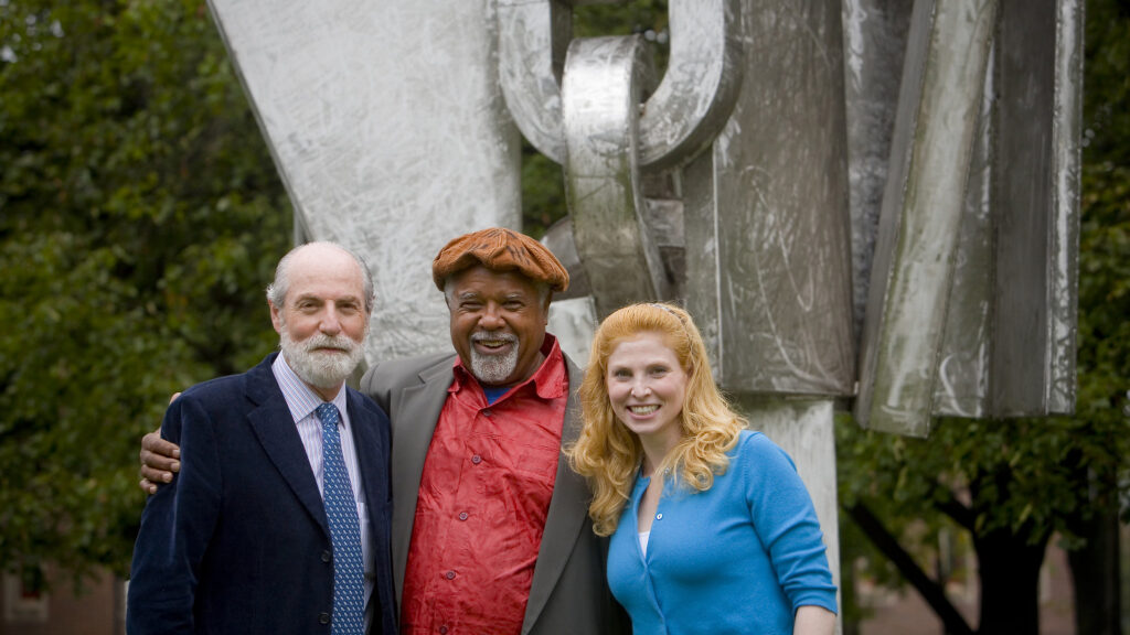 Richard Koplin ’64 P’91 (left), is pictured with artist, Melvin Edwards, and daughter, Russel Arden Koplin, at the dedication of the Transcendence statue at Lafayette in 2008. Melvin Edwards created the statue to honor David McDonogh 1844.
